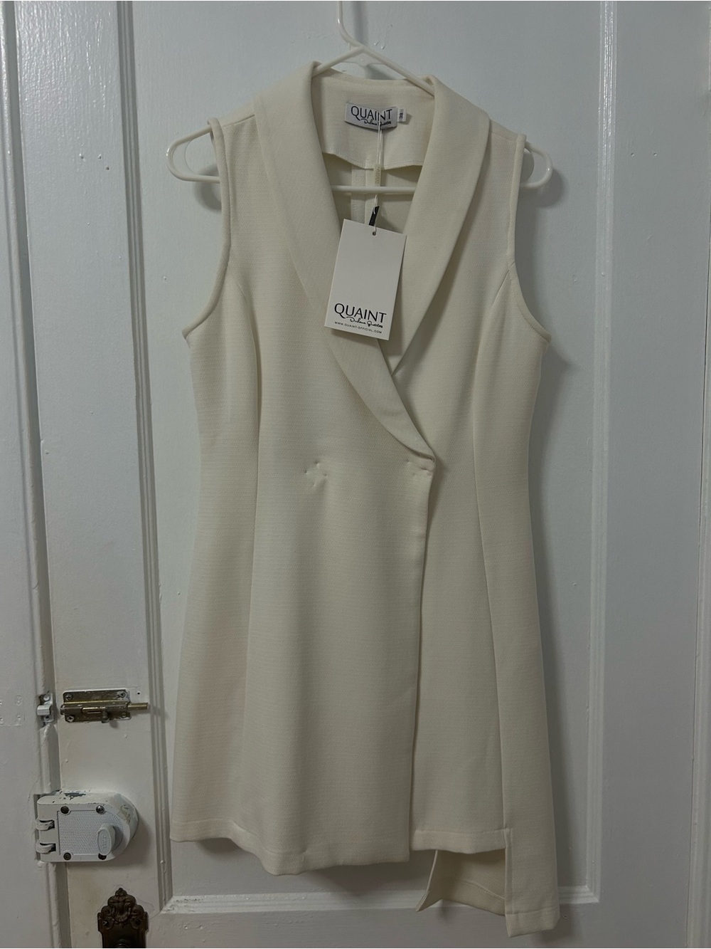 Sleeveless Cream Mini Dress with Tailored Lapel